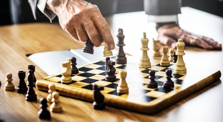 Chess players at an Eiker Sjakklubb tournament